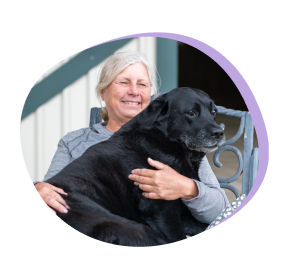 Bitey sitting on Dana's lap