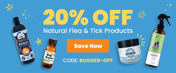 Dogs running in grass with natural flea and tick products.