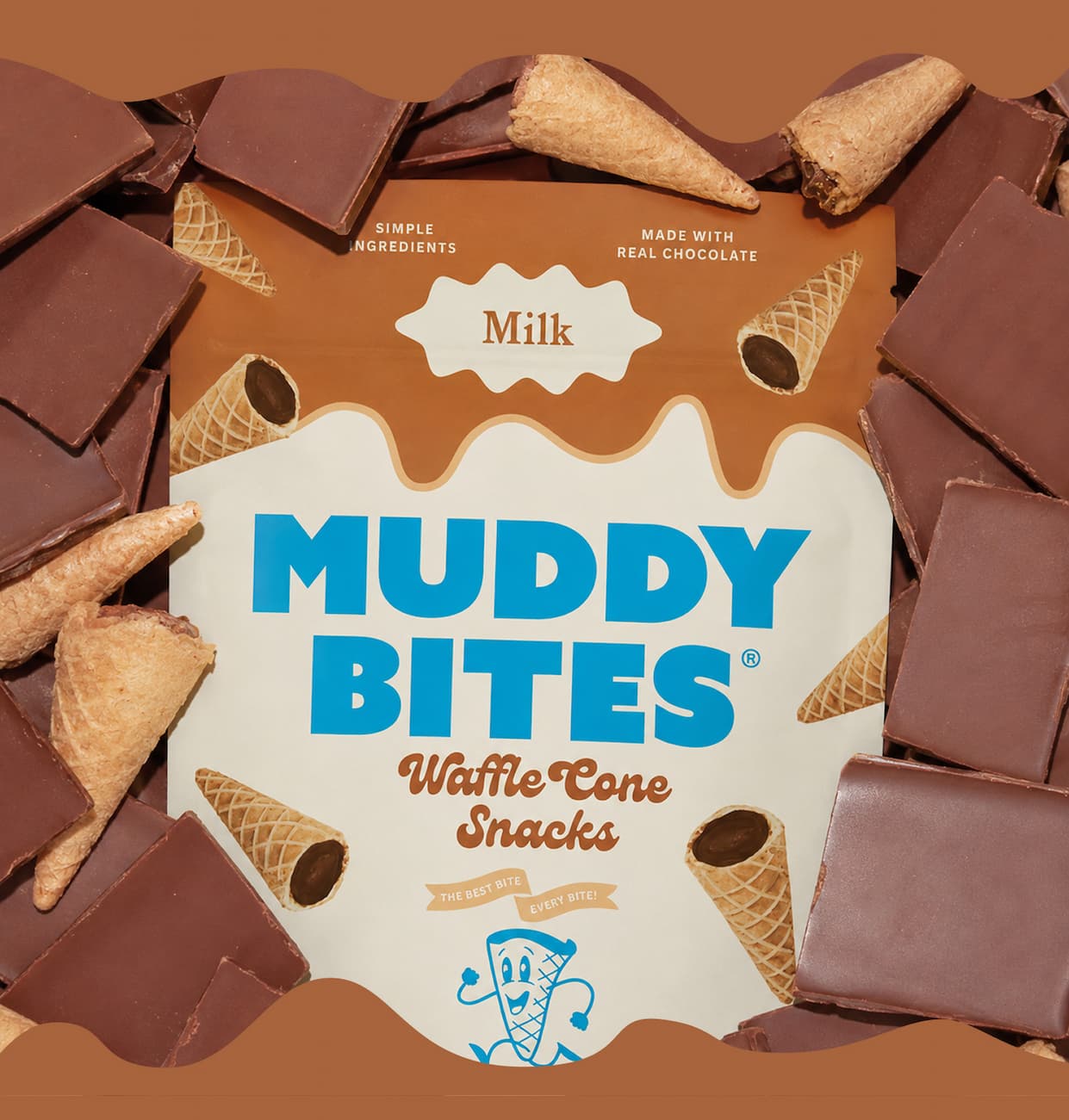 Photo of Milk Muddy BItes below a pile of chocolate pieces/