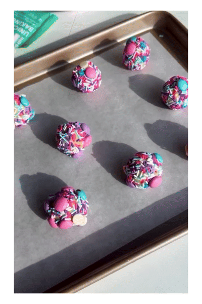 A looping gif of baking cookies that have been rolled in Fancy Unicorn Baking Confetti