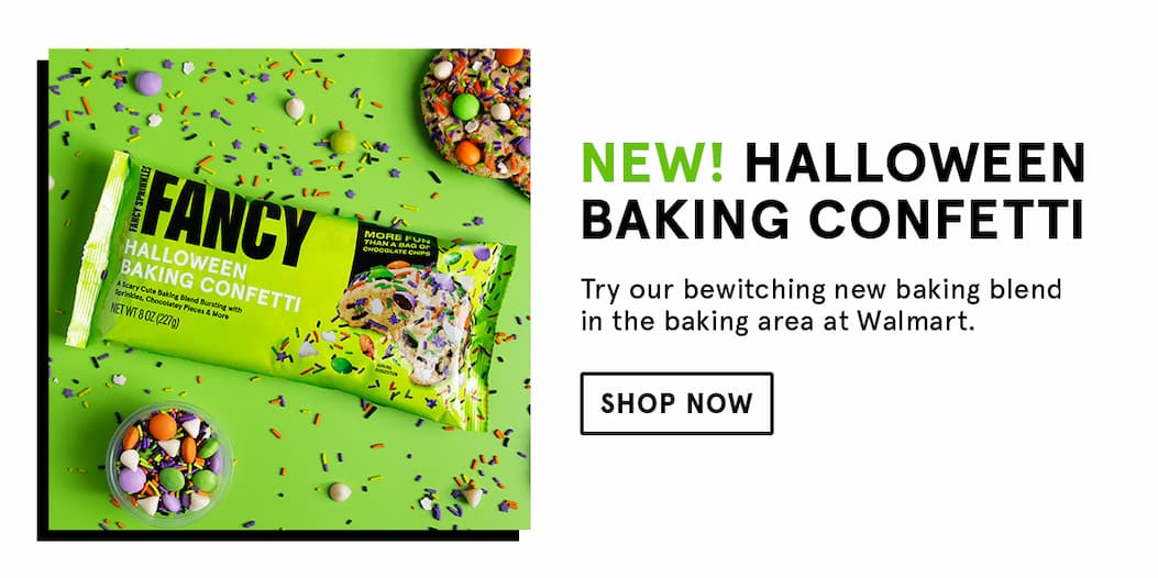There is an image of our bright green packaging for Halloween Fancy Baking Confetti on a bright green backdrop. Text next to it says "New! Halloween Baking Confetti" and invites you to try our bewitching new baking blend in the baking area at Walmart. 