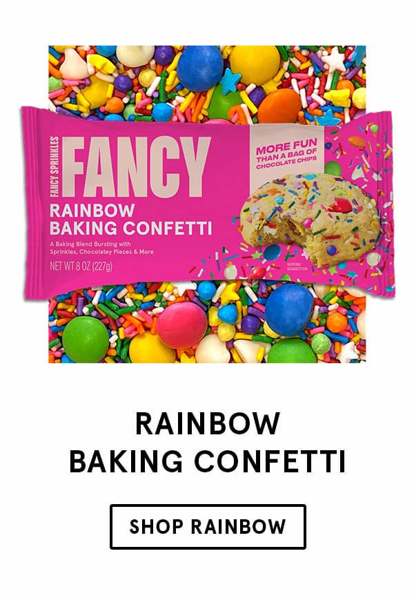Fancy Rainbow Baking Confetti comes in a bright pink colored bag and contains a celebratory and saturated colored mix of sprinkles, chocolate pieces, and vanilla chips.