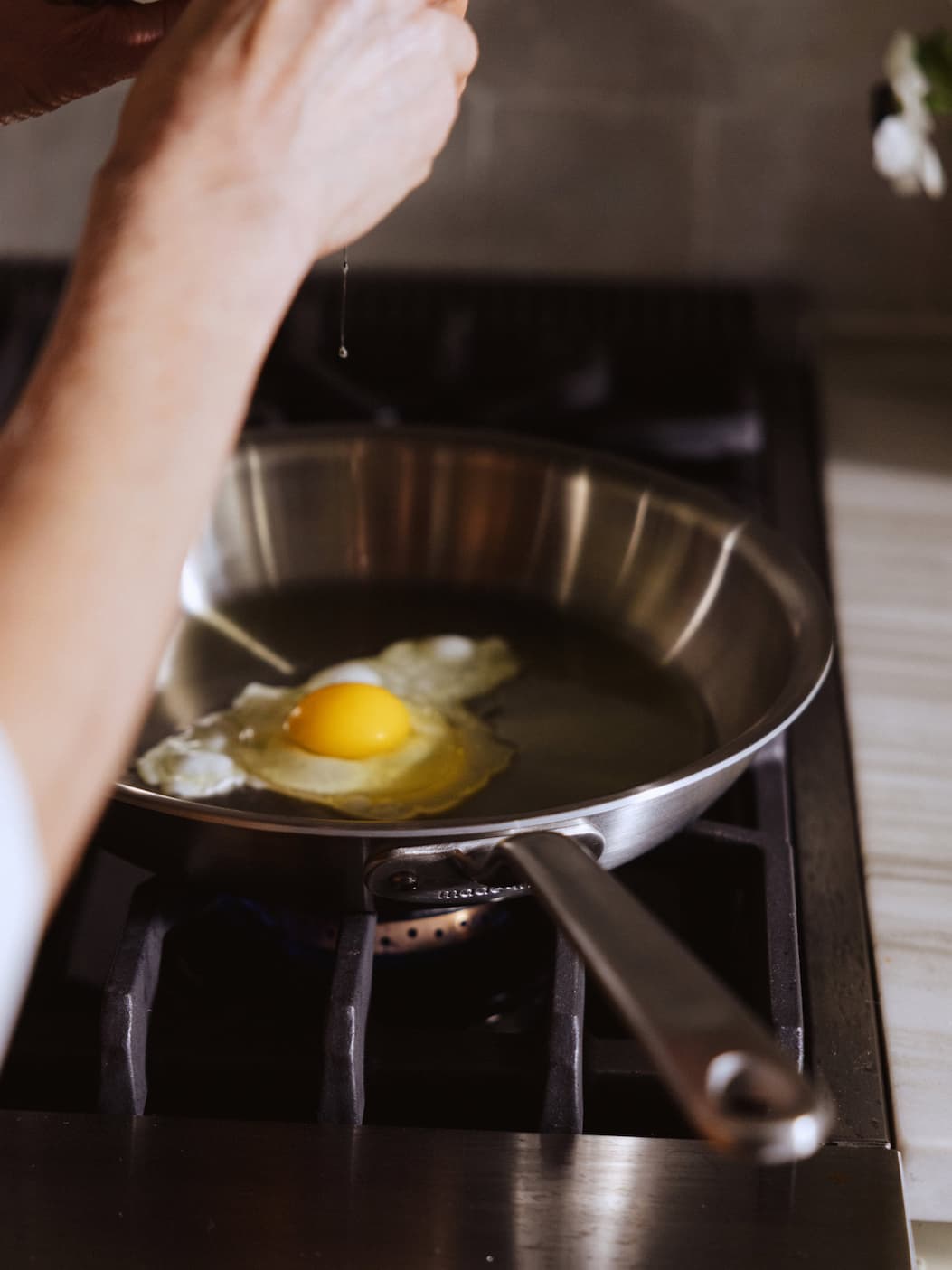 egg frying in stainless clad fry pan egg frying in stainless clad fry pan