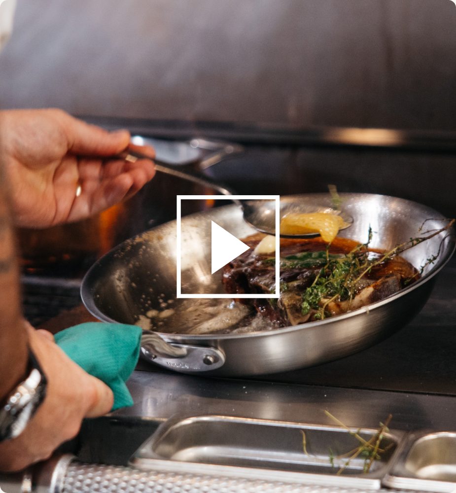 Searing steak in a Stainless Clad pan — play video