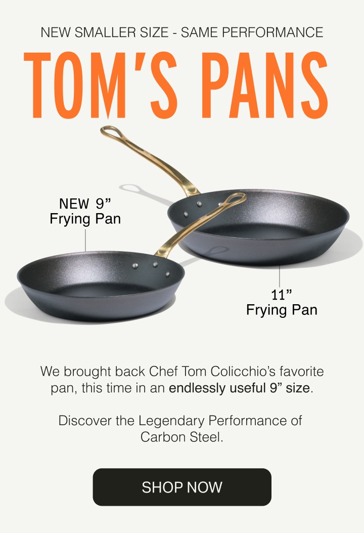 A steak sizzling in a skillet