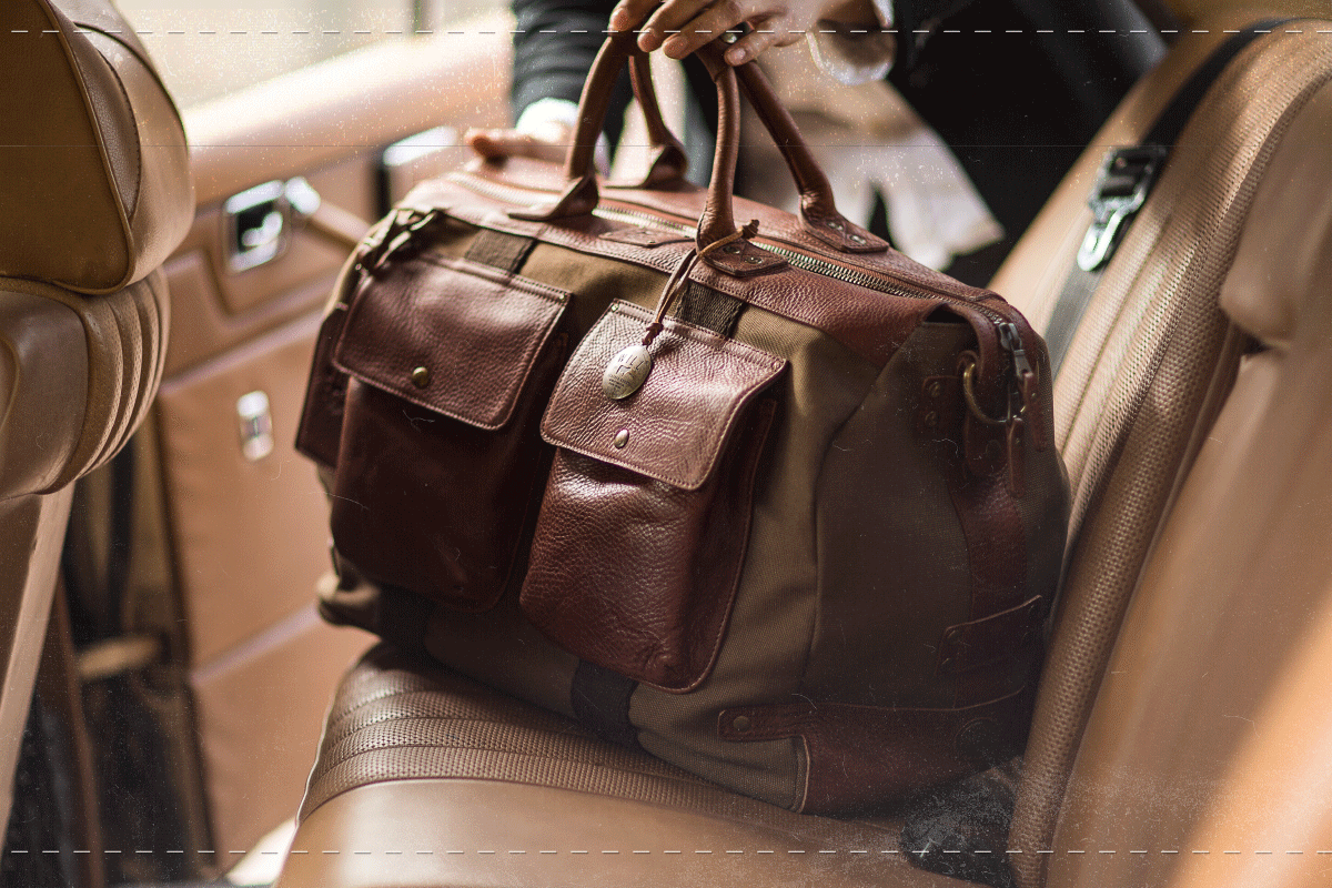 Customer carrying a full-grain leather Will Leather Goods bag