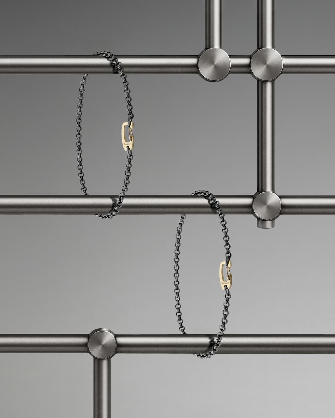 an image of a couple of bracelets that are on a rail