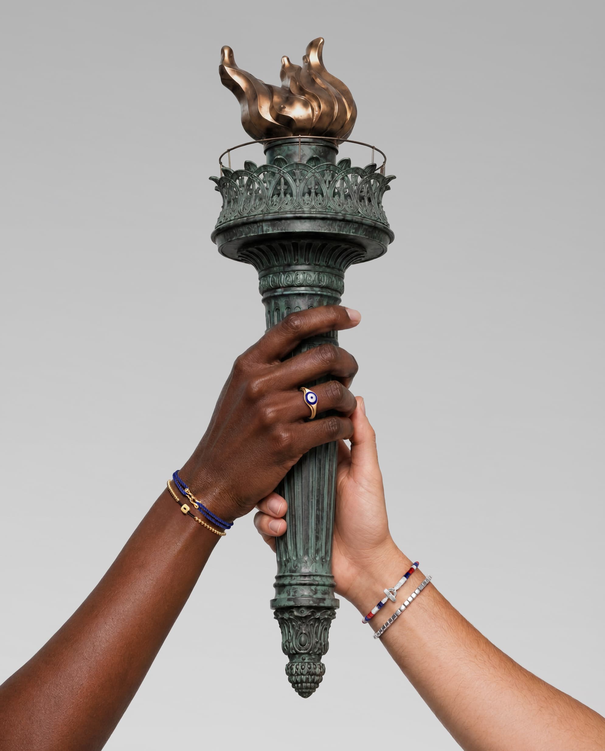 Hands holding a torch