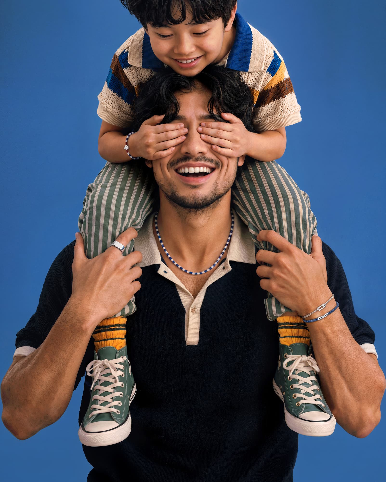 Man with his son.