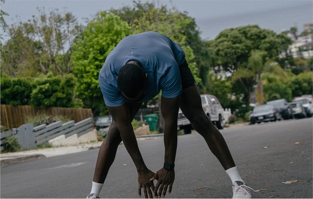 Banner: Stretching in Blue Shirt