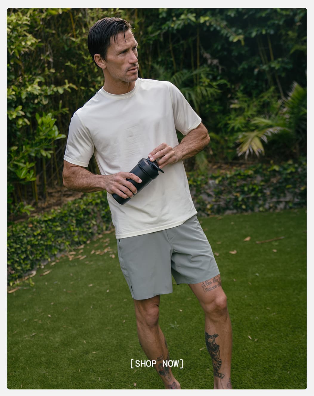 Lifestyle image of Fir Green Micro-X Interval Shorts paired with off-white Interval Tee