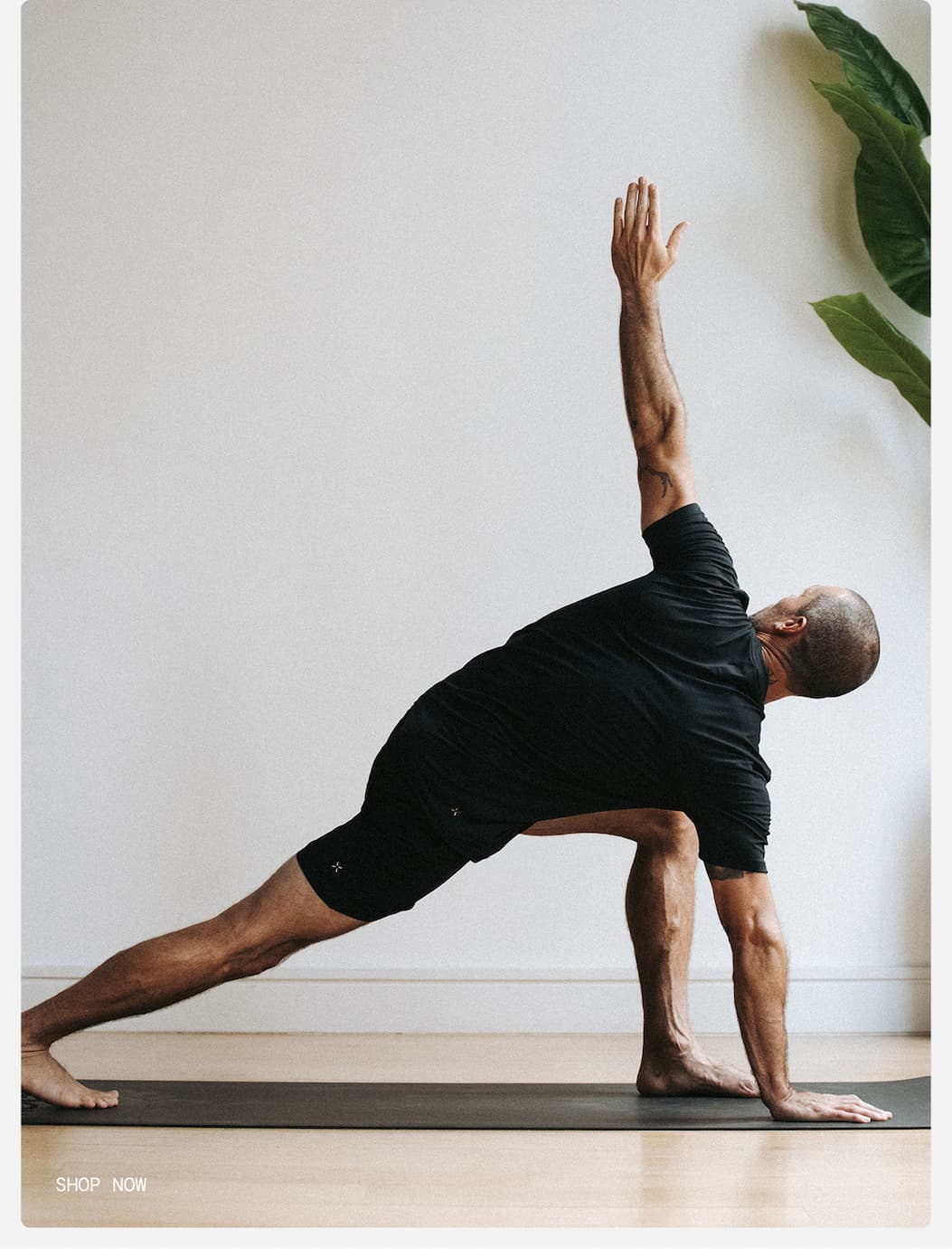 Lifestyle Image of Yoga Dude Practicing in Foundation Shirt and Short