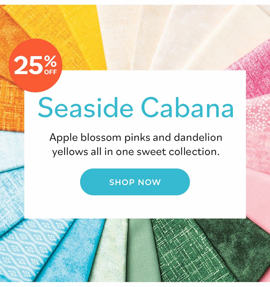Image: A collection of quilting fabrics in golden yellows, soft creams, pinks, rich greens, and light blues. Text: Seaside Cabana. Apple blossom pinks and dandelion yellows all in one sweet collection. Shop Now >>
