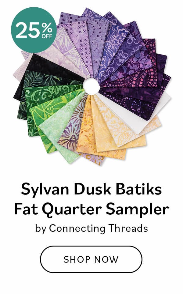 Image: A fanned circle of batik fabrics in purples and golds. Text: Sylvan Dusk Batiks Fat Quarter Sampler by Connecting Threads. Shop Now >>