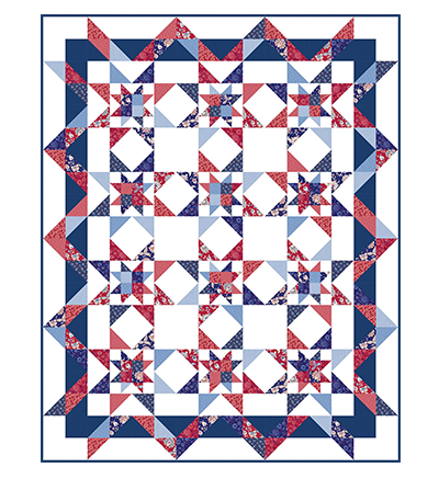 A white quilt top with red and blue star blocks >>