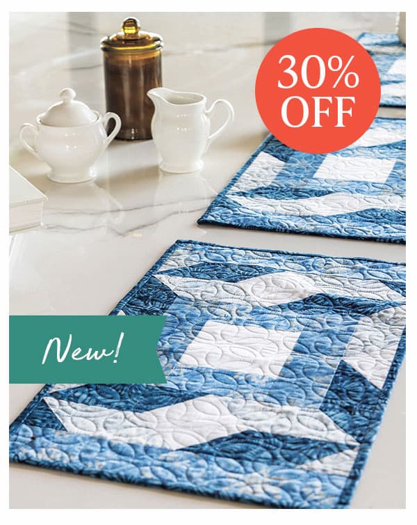 Image: A set of blue quilted placemats. Text: 30% off >>