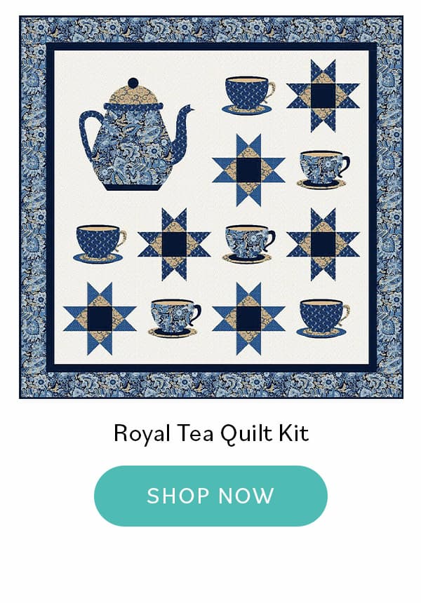 Image: A square quilt with patterned blues and tans, featuring tea and teapot themed blocks. Text: Royal Tea Quilt Kit. Shop Now >>