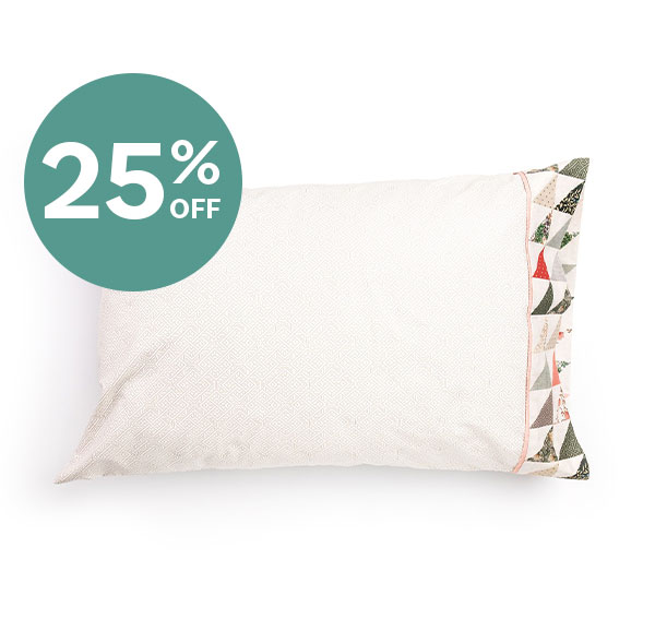 25% off. A handmade white pillow case with green and pink details on the side
