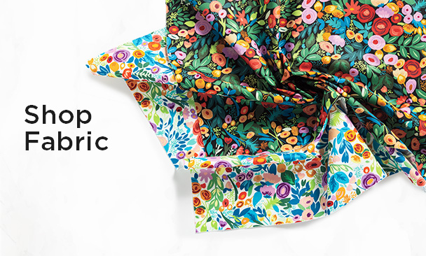 Text: Shop Fabric Image: a colorful floral fabric twisted into a swirl