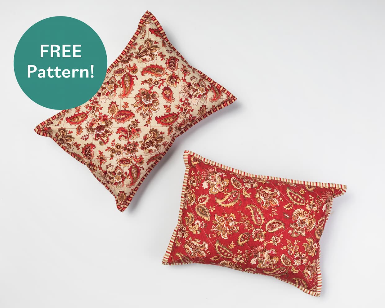 Two red detailed quilt fabrics