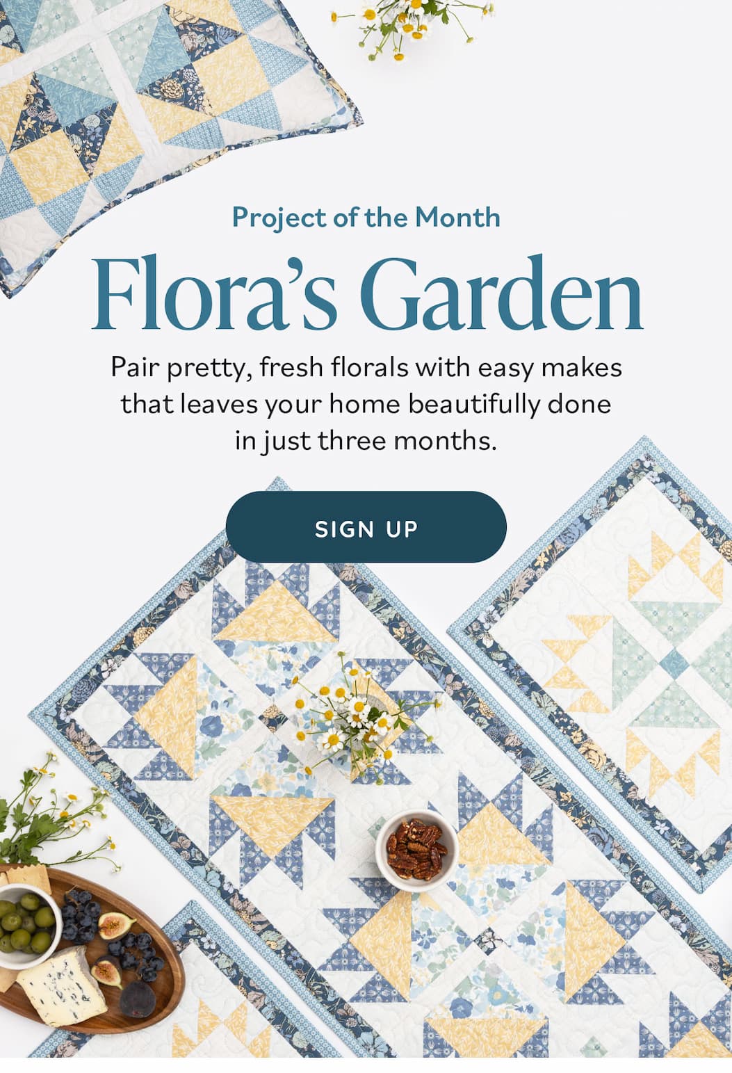 Image: Quilted placemats, a table runner, and pillow in blues and yellows. Text: Project of the Month. Flora's Garden. Pair pretty, fresh florals with easy makes that leaves your home beautifully done in just three months. Sign up >>