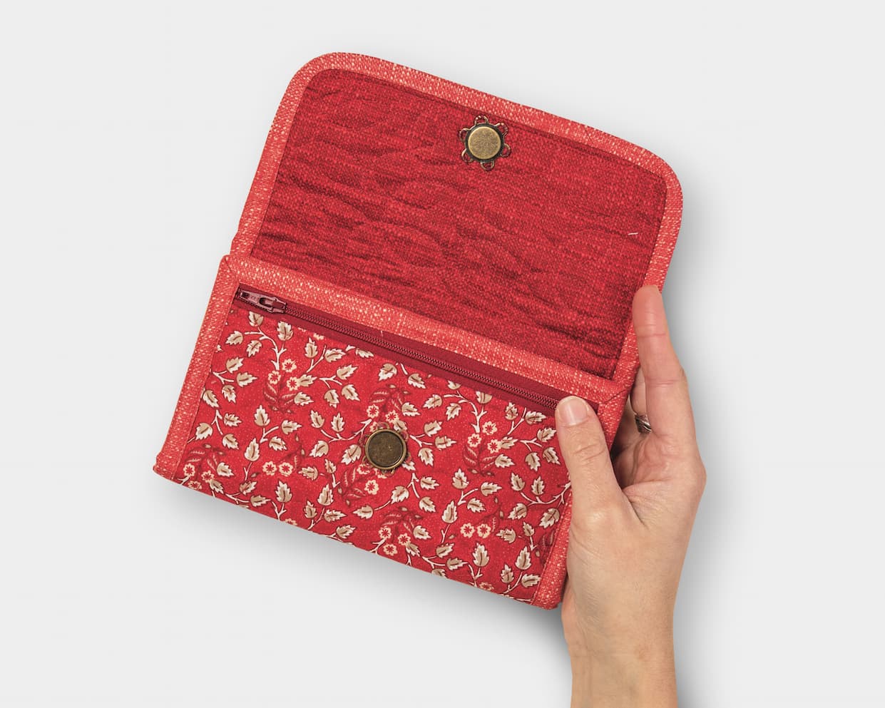 A red detailed quilt wallet