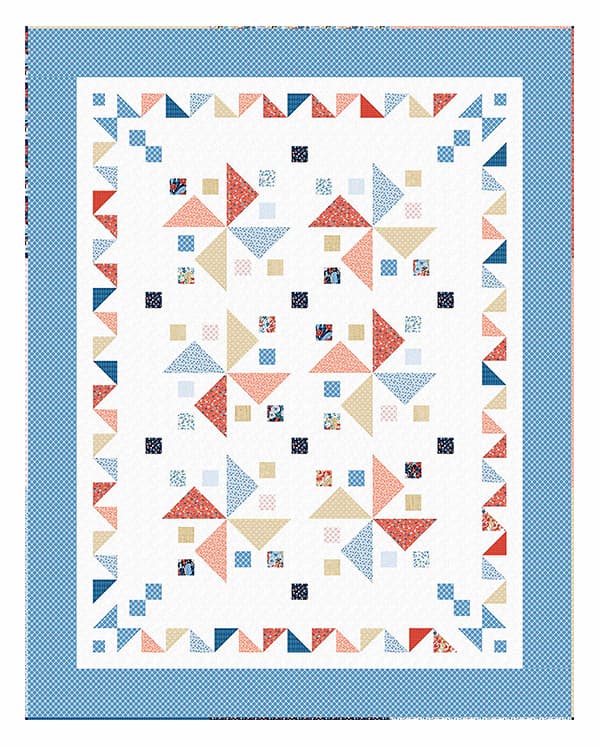 A white quilt with colorful pinwheel blocks and a bright blue border >>