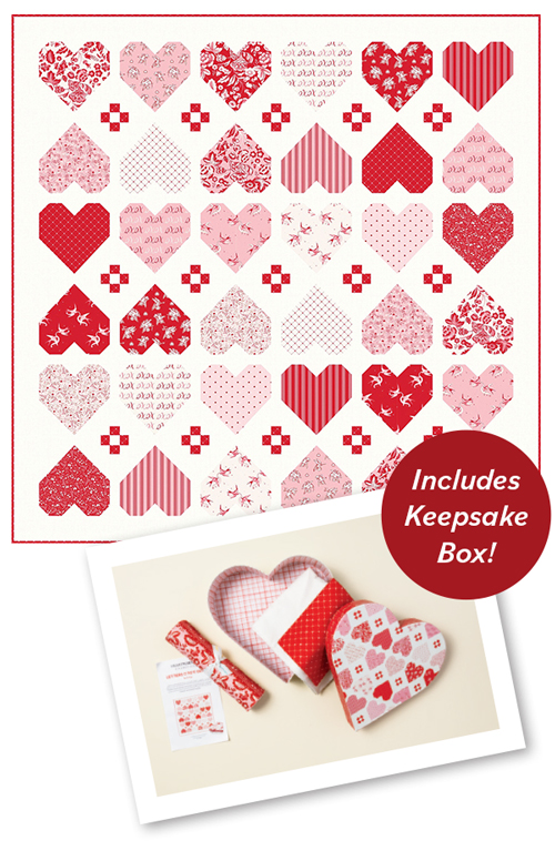 Includes Keepsake Box! A handmade quilt with red and pink hearts