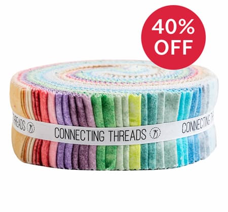 Image: A roll of flannel fabric strips in soft colors. Text: 