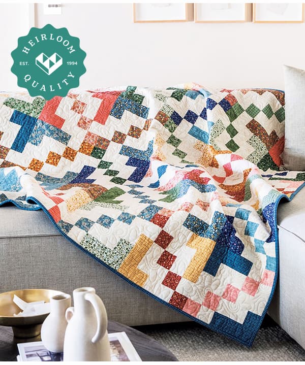 Colorful quilt on a couch