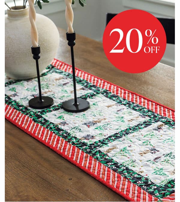 20% Off. A red, green, and white Christmas themed table runner