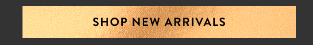 an image of a gold sign that says shop new arrivals