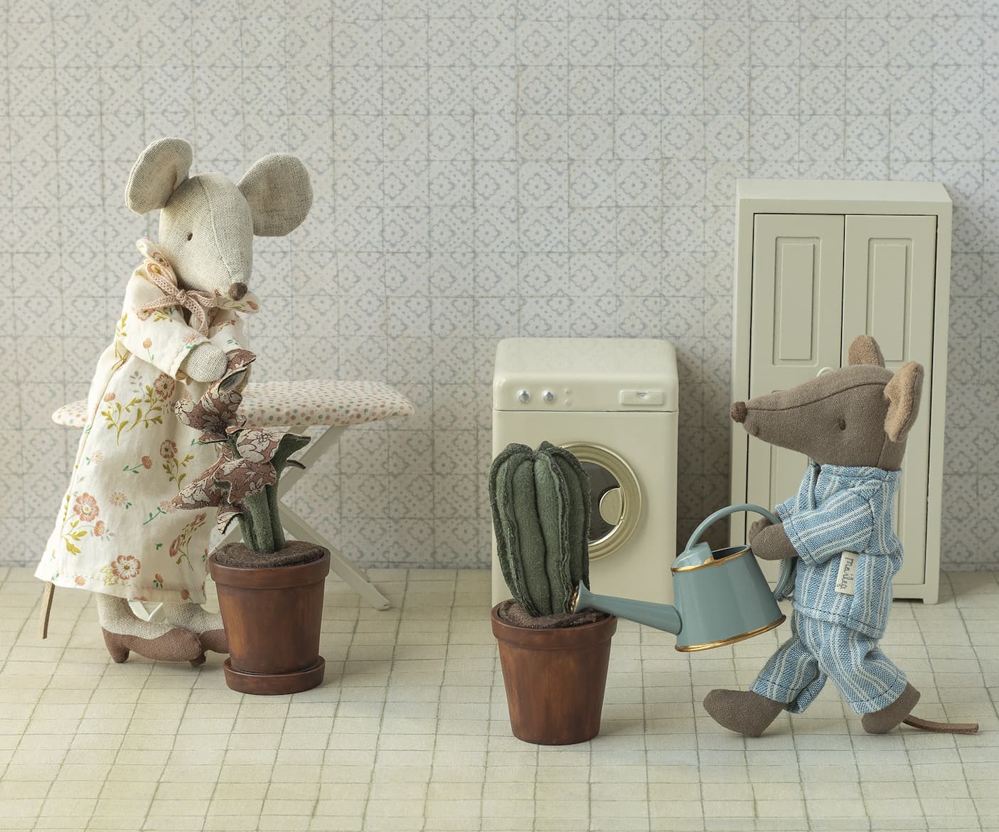 Maileg mice watering plants.