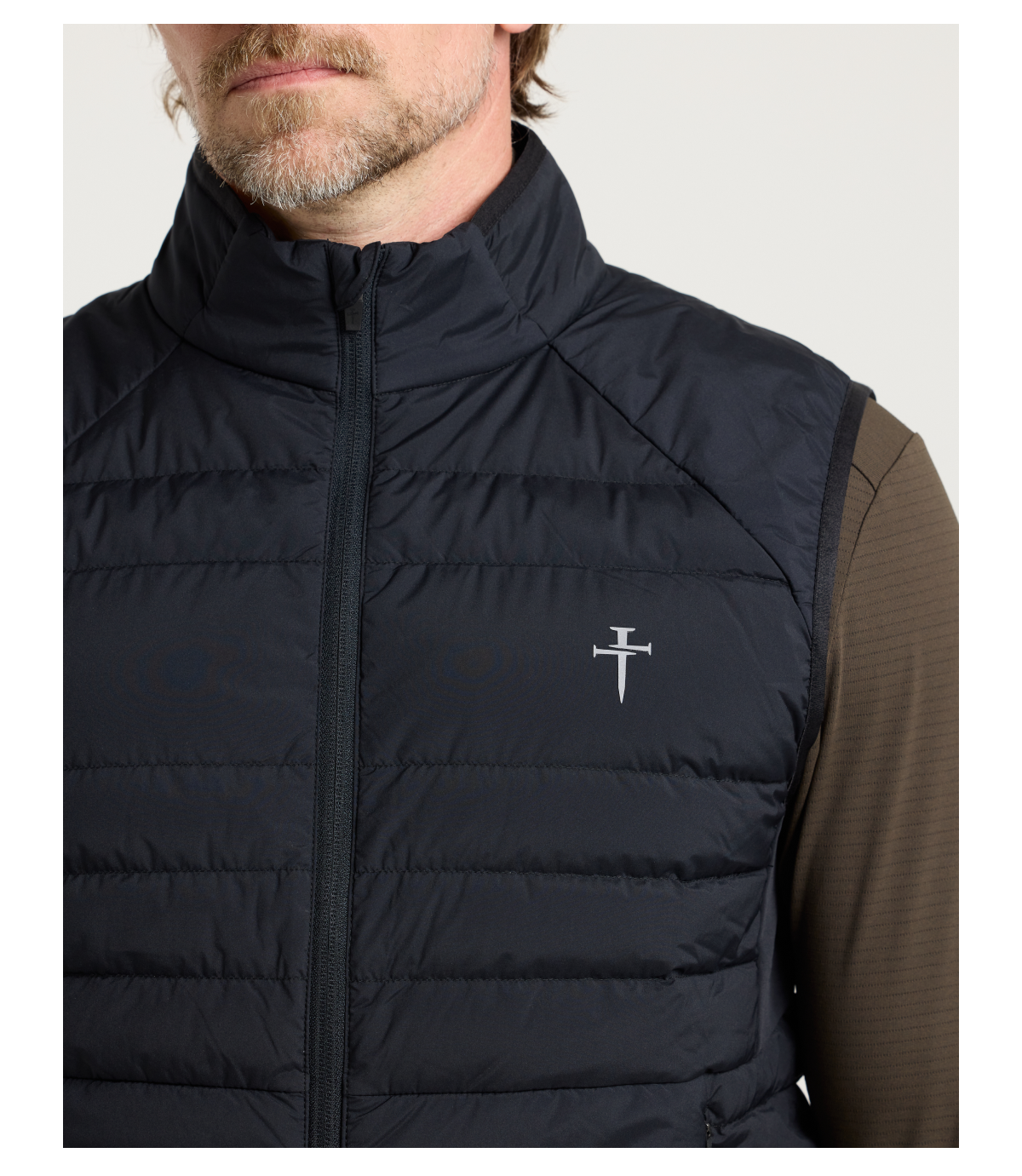 Arc Down Vest Core warmth without the bulk. Premium 90/10 duck down insulation and a breathable stretch back panel keep you warm and moving freely. • Breathable stretch back panel • Full-zip front with branded zipper pull • Two zippered hand pockets • Internal phone and key pockets • Reflective logo details SHOP NOW