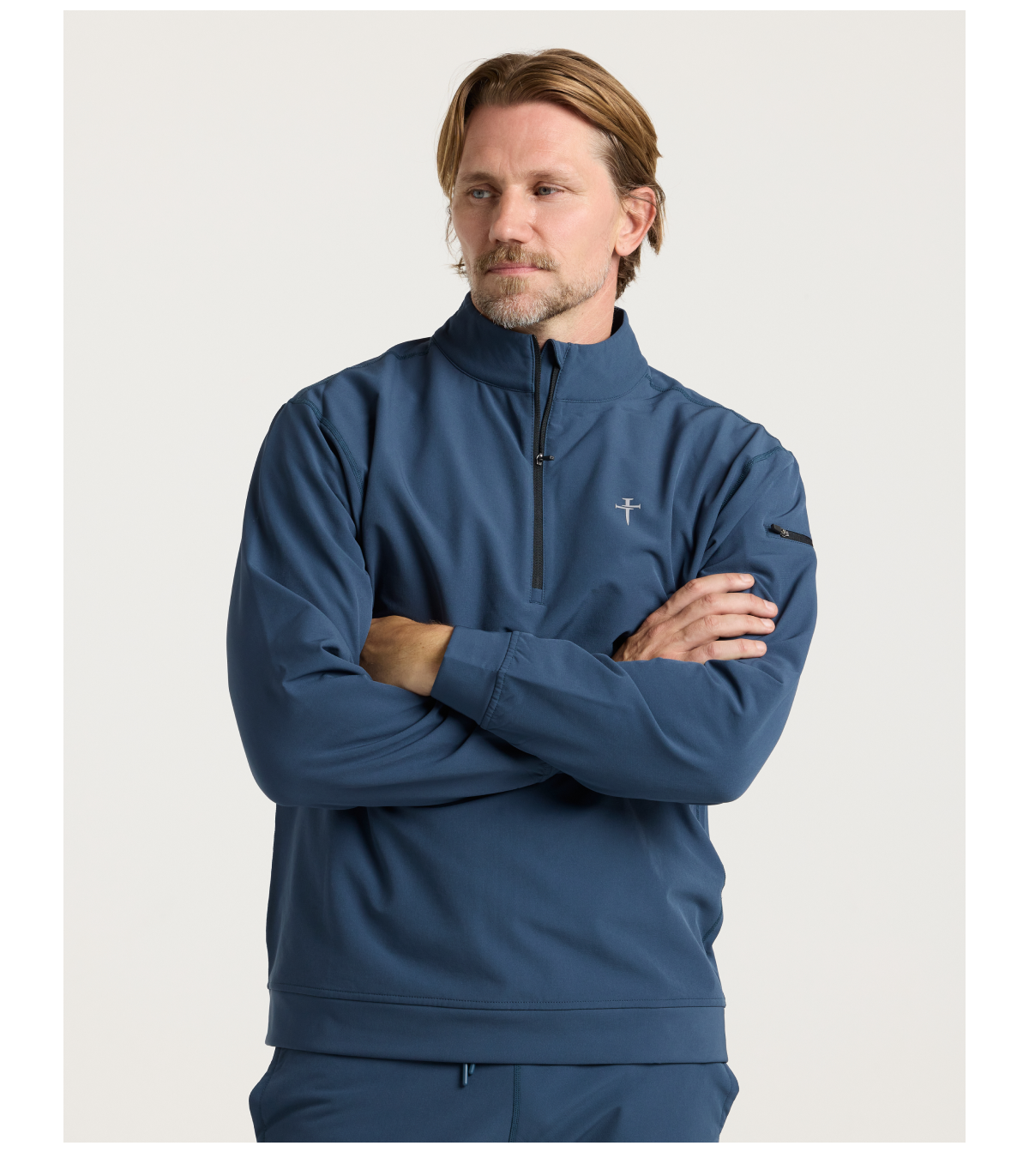 Vanta+ Quarter Zip Built to layer without limits. Water-repellent and built with a discreet sleeve pocket for small essentials. Available in Cross and Minimal styles. • Polygiene® anti-odor treatment • Secure zipper sleeve pocket • Four-way stretch with flatlock seams • Reflective branding SHOP NOW