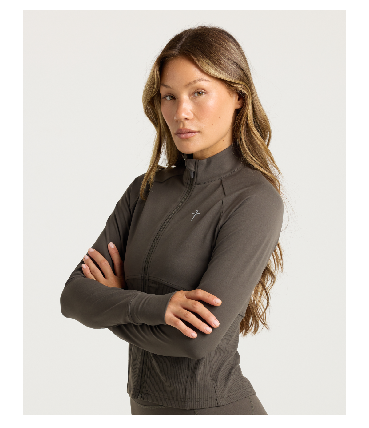 Nova Fitted Full-Zip Jacket Performance meets polish. Designed to move naturally from workouts to wherever the day goes. • Fitted high-hip silhouette • Thumbhole cuffs • Invisible zipper pockets • Buttery soft Nova fabric