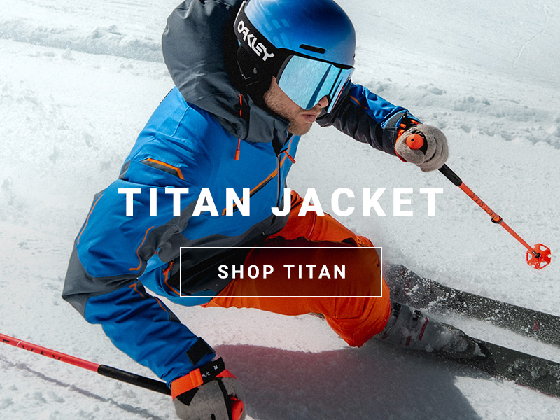 Skier wearing he Titan Jacket in Slate Blue - Shop Titan