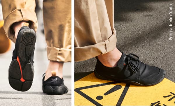 Two photos of black Wildling Minimal shoes with a split outsole (Gap Sole) being worn on asphalt.