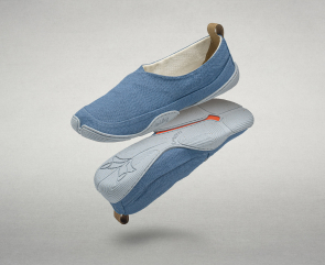 Image of 4 products: A light blue fabric Wildling minimalist shoe, a cream-colored Wildling minimalist shoe with a light, abstract leopard-style pattern a beige Wildling minimalist shoe made of a textured natural fabric and a  light green fabric Wildling
