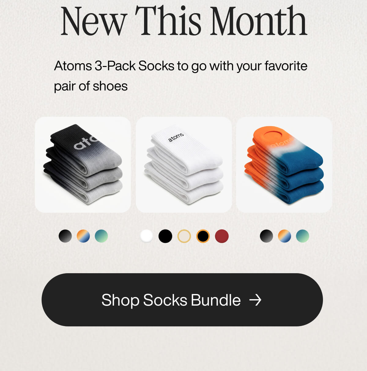 "New Atoms socks in black, white, and blue-orange gradient. Available in a 3-pack. Shop the bundle now for stylish comfort."