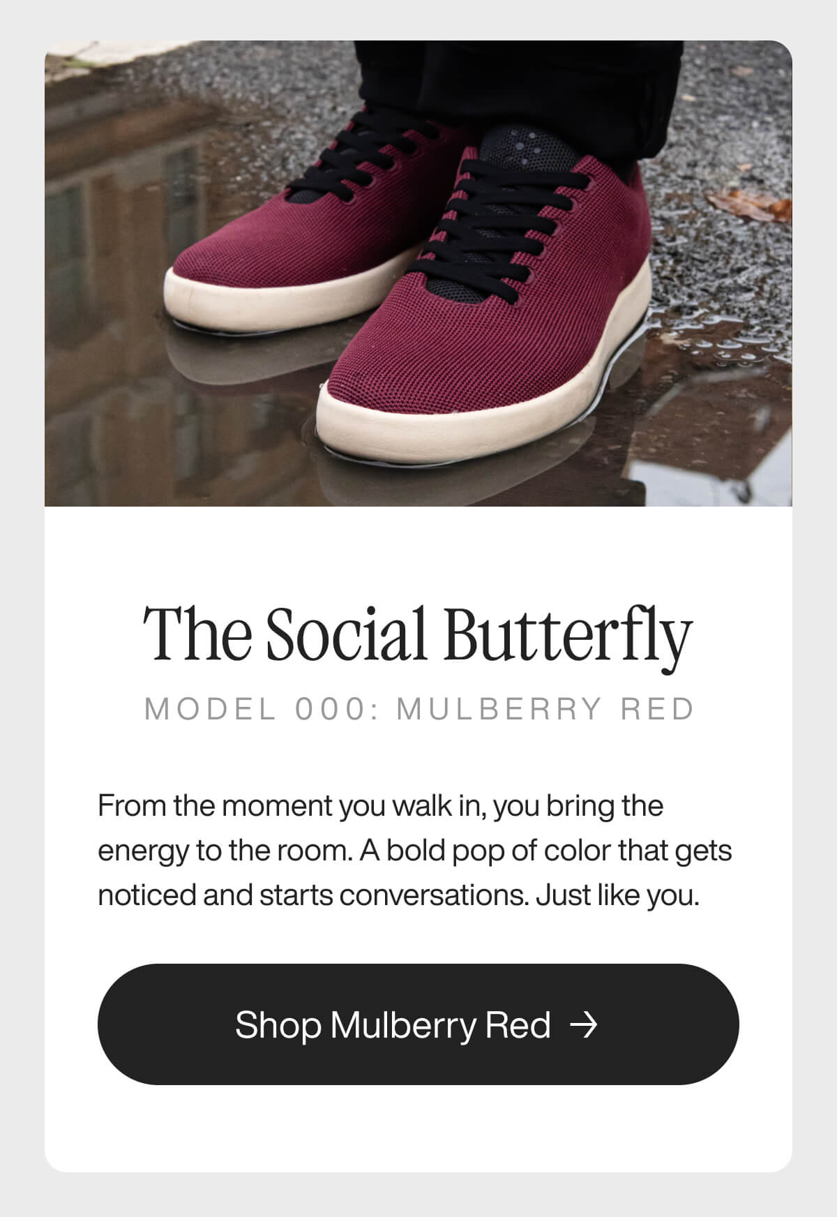 "Mulberry Red sneakers on wet pavement, reflecting style. Text: "The Social Butterfly, Model 000." Shop button below."