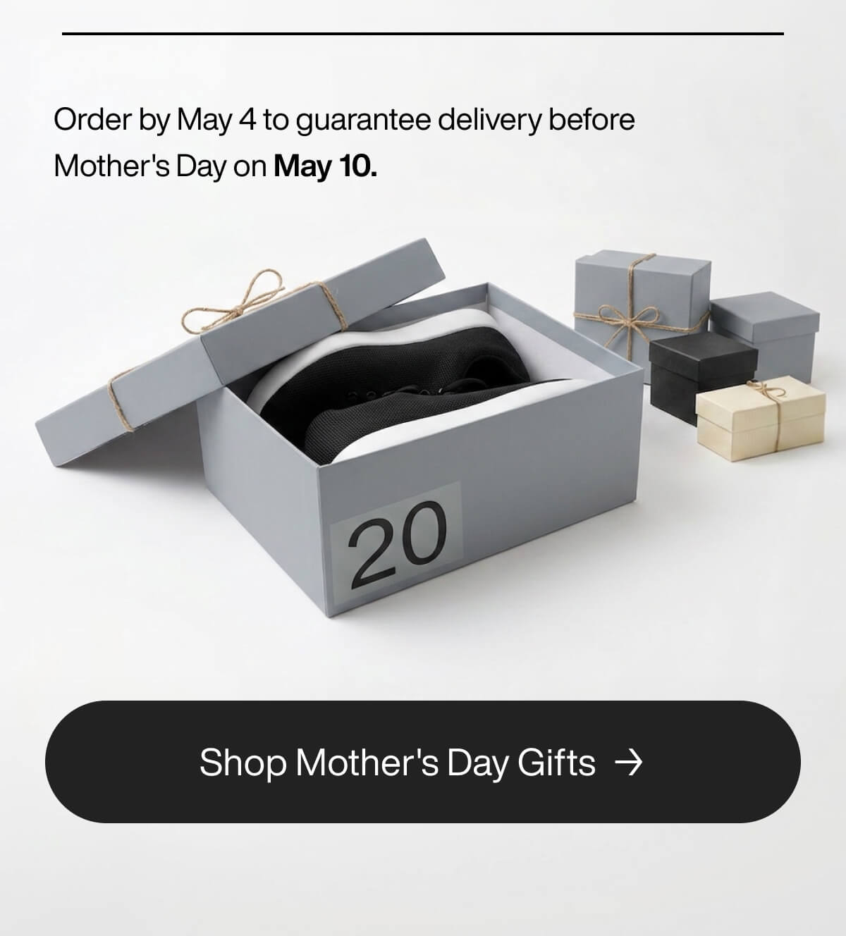 Open gray shoebox with black and white shoes, surrounded by wrapped gifts. Text reads: "Order by May 4 for Mother's Day delivery on May 10." Button: "Shop Mother's Day Gifts."