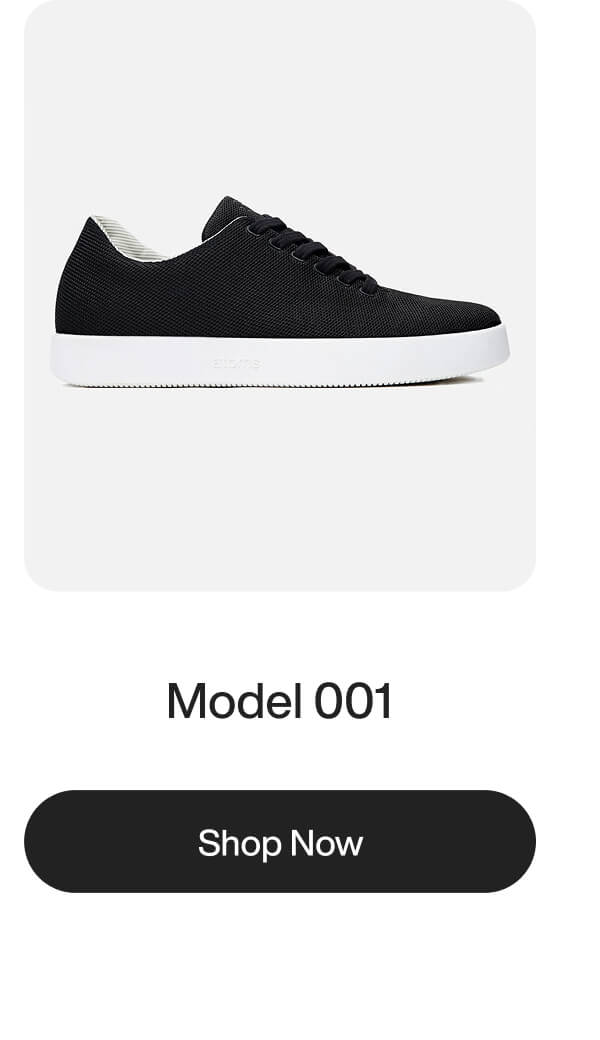 Black sneaker with a white sole, featuring a minimalist design, displayed against a light background. Below, text reads "Model 001" and "Shop Now" button.