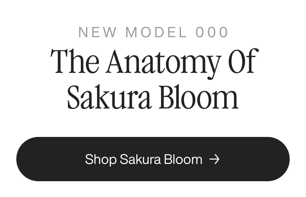 Text promoting 'New Model 000: The Anatomy of Sakura Bloom' above a black button with 'Shop Sakura Bloom' and an arrow, set on a white background.