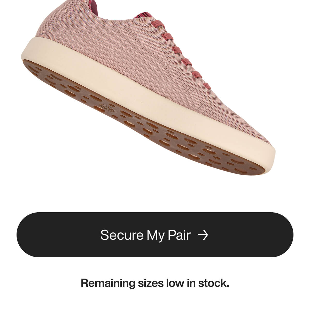 A pink sneaker with a cream sole is tilted upward, highlighting the textured sole design. Below, a black button reads "Secure My Pair," with "Remaining sizes low in stock" in smaller text.