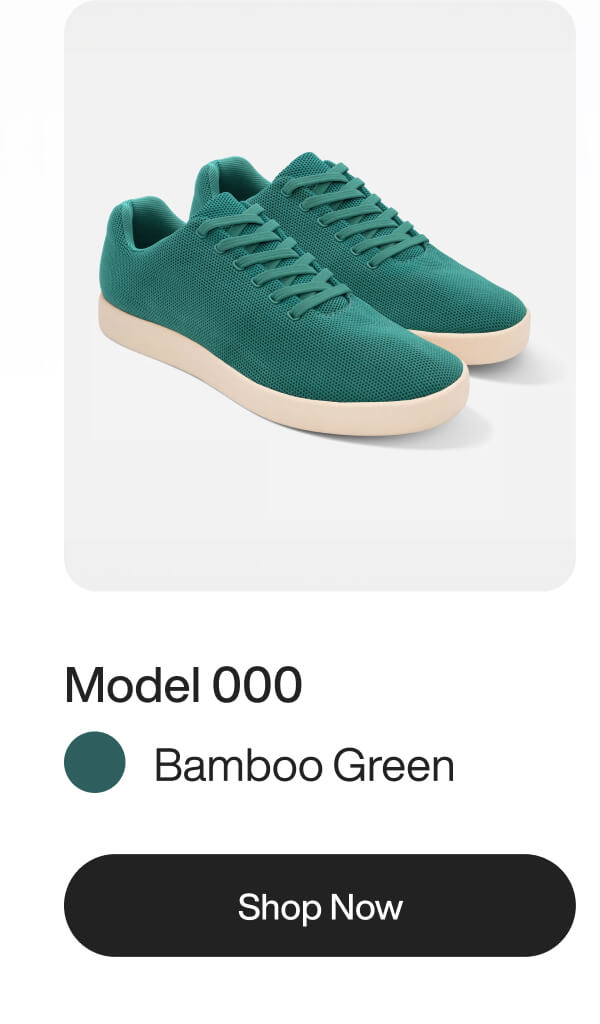 Bamboo Green sneakers, Model 000, with white soles displayed on a white background. Shop Now button below.