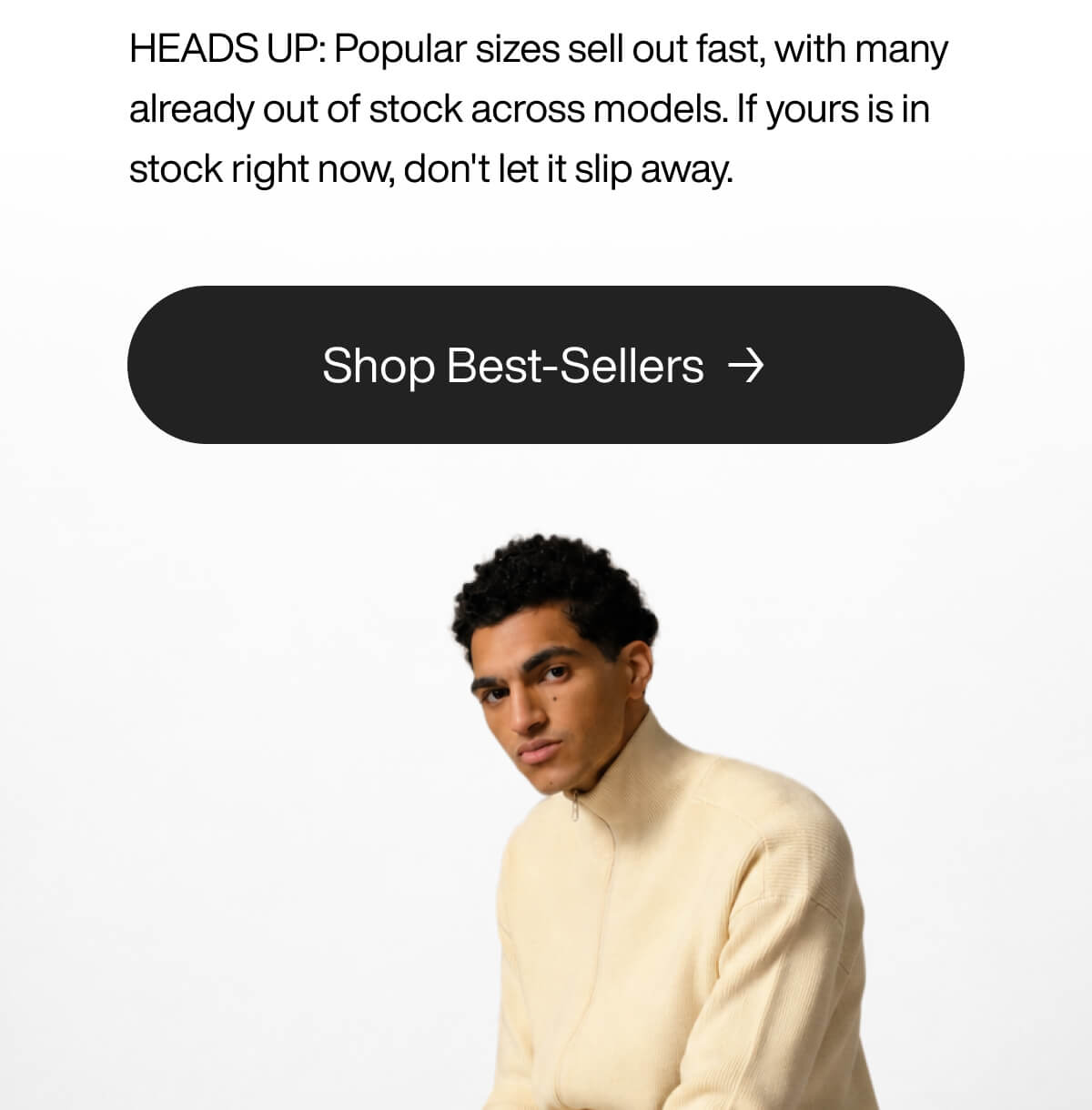 Man in beige sweater sits under text urging quick purchase of best-sellers. Button reads "Shop Best-Sellers.
