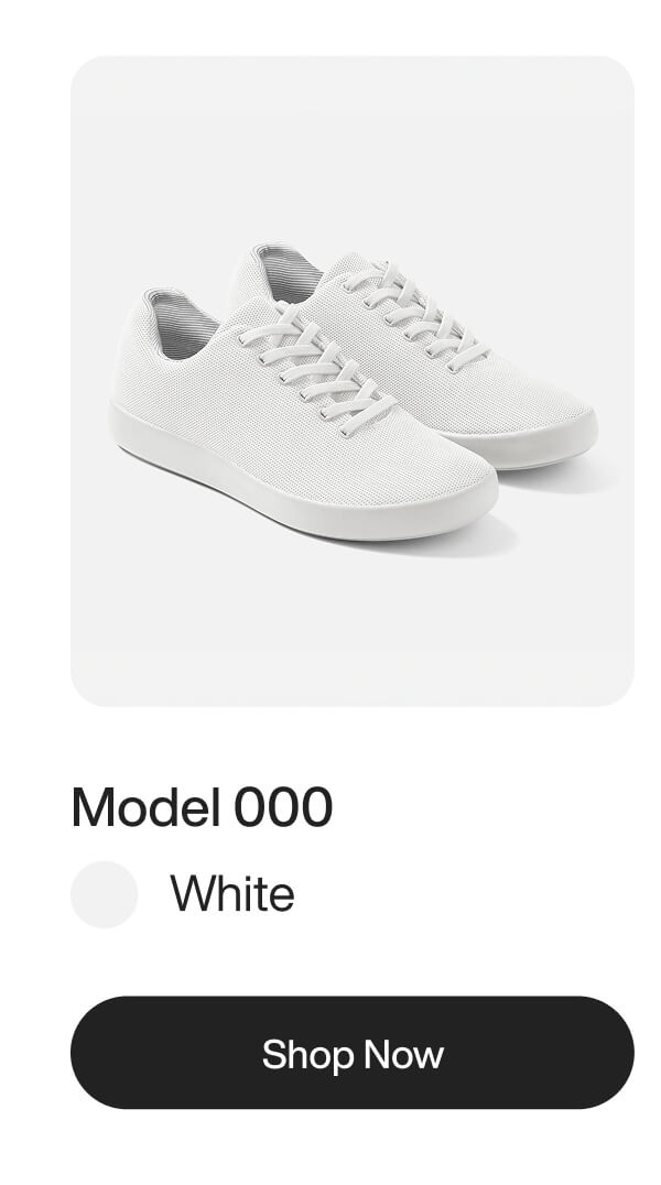 White sneakers, Model 000, displayed on a clean background with a "Shop Now" button below.