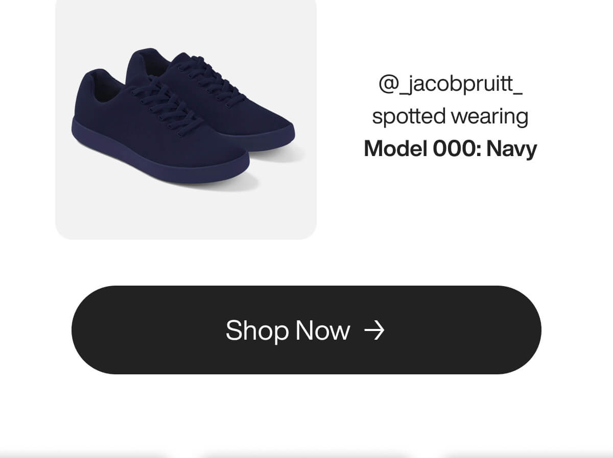 Navy blue sneakers labeled "Model 000" displayed on a white background. Text beside reads "@_jacobpruitt_ spotted wearing." A "Shop Now" button is below.