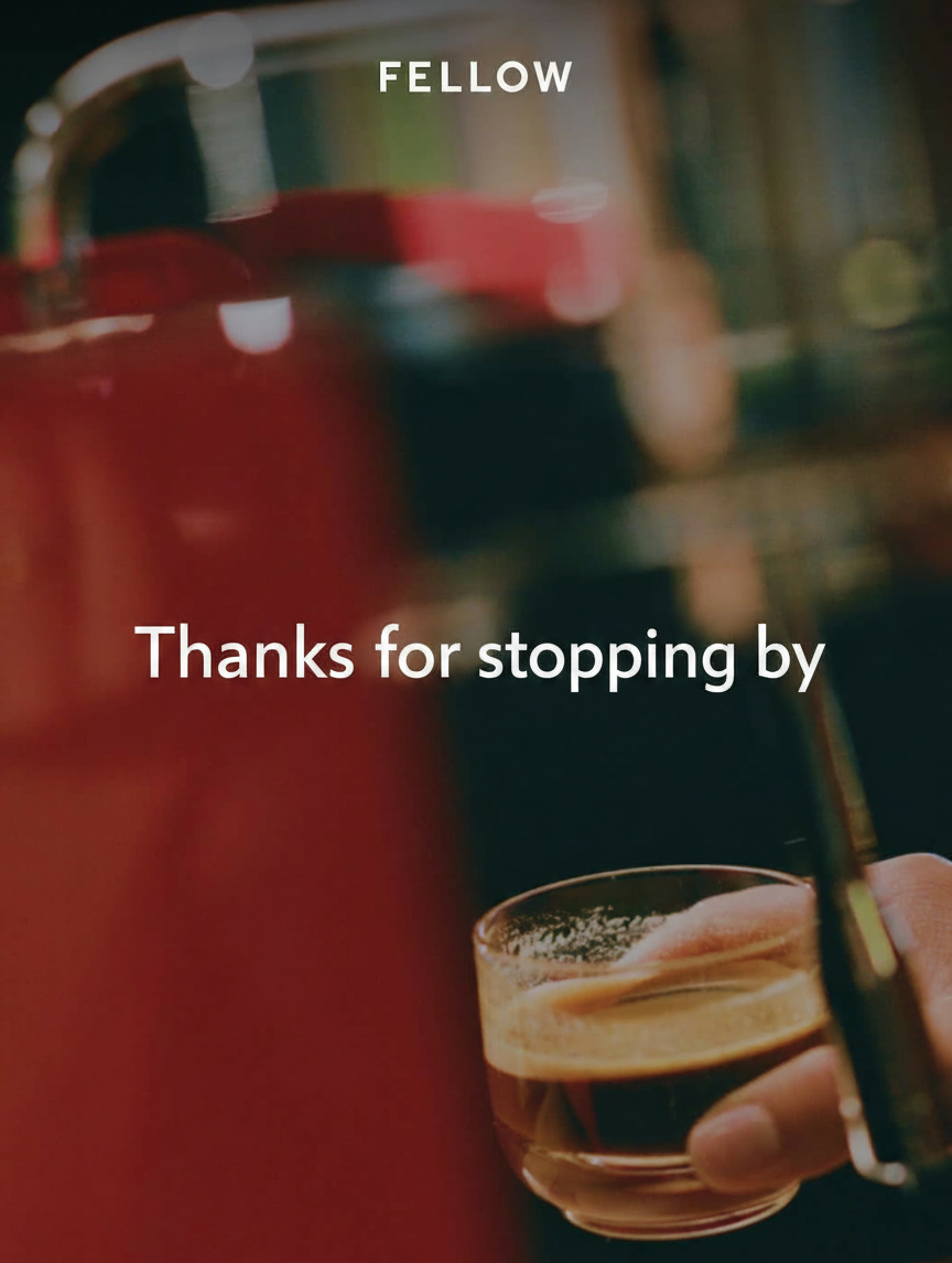 A hand holds a shot of espresso with the text "Thanks for stopping by" and "FELLOW" overlaid.